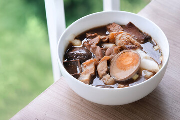 boiled chinese pasta square pork with inside organ