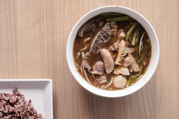 assorted of inside organ beef soup eat with steamed rice
