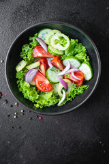 salad vegetable tomato, cucumber, pepper, onion, lettuce meal snack copy space food background rustic. top view