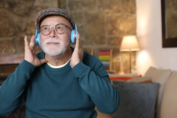 Senior man listening to music