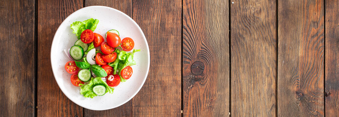 salad vegetables cucumber, tomato, onion, lettuce food organic products meal snack copy space food background rustic. top view keto or paleo diet veggie vegan or vegetarian food