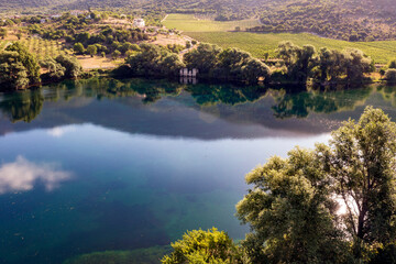 Lake Capodacqua, aerial view, reflections, clarity, water transparency, flight, ancient remains, underwater, fly, landscape, drone, image, photo