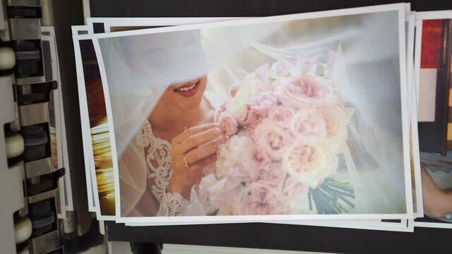 chemical printing of photos from the wedding in the photo laboratory. 