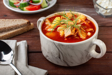 Tomato soup with potatoes and beans. Tomato thick soup. Tomato soup with potatoes and chicken.