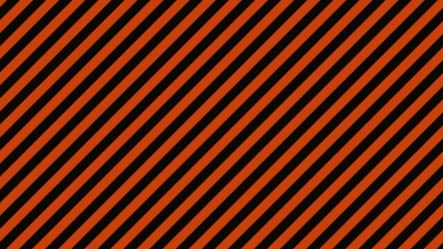 Black and orange diagonal stripe background (seamless loop)