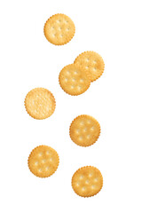 Cracker cookies falling isolated on white background with clipping path.
