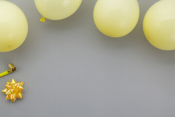 Happy birthday background, Flat lay party decoration on pastel grey background.