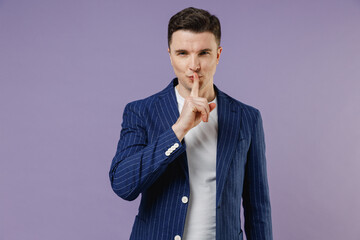 Secret young employee business man corporate lawyer 20s wears formal blue suit white t-shirt work...