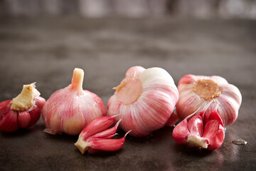 Fresh whole garlic and pickled garlic