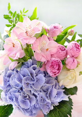 beautiful floral bouquet and butterflies close up, nature background. gentle lovely floral gift. Greeting card design. symbol of love, romance.