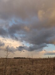 storm clouds over the winter field