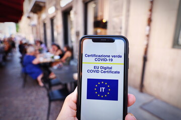 Italian Green Pass. EU Digital certificate Covid-19. Covid or Coronavirus vaccine certificate. Selective focus
