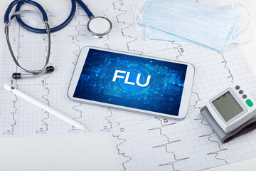 Close-up view of a tablet pc with medical abbreviation