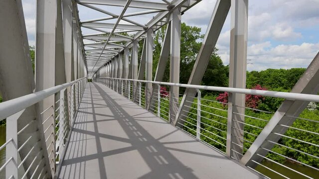 Zeran Canal pedestrian and cycle bridge linking the Praga and Bialoleka districts of Warsaw, Poland, 4k footage