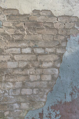 Grunge cracked brick stucco wall background