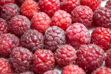 A close-up shot of a fresh raspberry - perfect for a food blog or photo wallpaper.