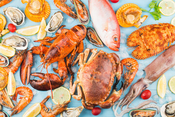 Seafood dinner, seafood dinner with fresh lobster, crab, mussel and oyster as background