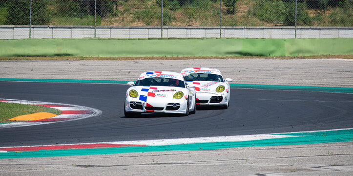 Porsche GT Supercar Racing Cars Couple In Action On Asphalt Track Overtaking Attempt