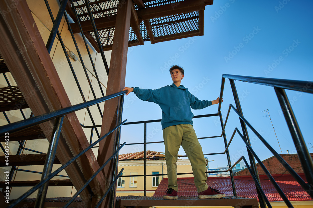 Wall mural boy on a sky background