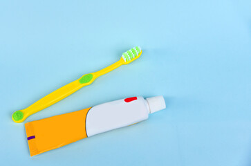 Tooth brush and toothpaste isolated on color background, concept of healthy life and dentist
