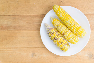 Closeup to white boiled corn 