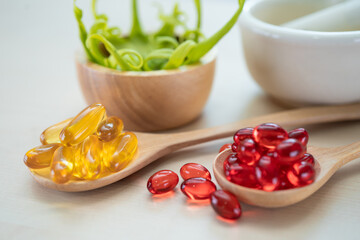 Alternative medicine herbal organic capsule with vitamin E omega 3 fish oil, mineral, drug with herbs leaf natural supplements for healthy good life.