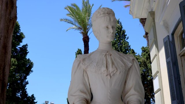 Statue of Empress Elisabeth of Austria known Sisi in front of Achilleion palace built in Gastouri on the Island of Corfu, Greece, 4k video