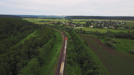 Aerial view of train in the forest