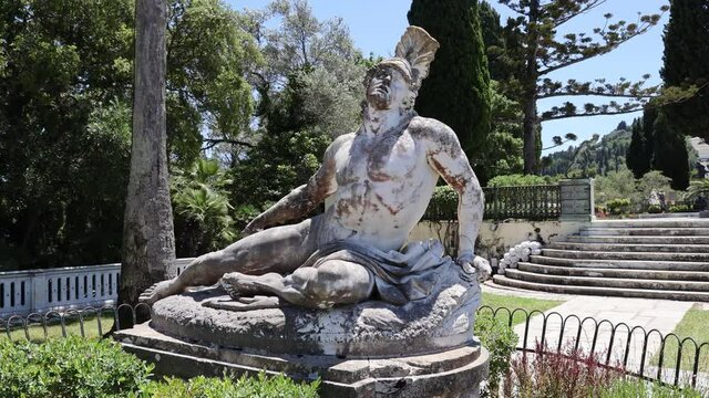 Dying Achilles statue in gardens of Achilleion palace built in Gastouri on Corfu island, Greece for the Empress Elisabeth of Austria, known as Sisi 4k