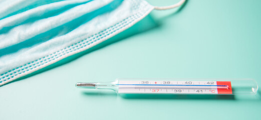 Medical thermometer. Glass thermometer for measuring the temperature of the human body like symptom...