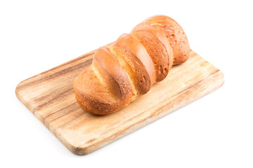 Bread loaf on a wooden chopping board