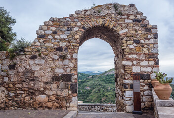 Arch ruins on Saint Antonio Square in Castelmola town on Sicily Island, Italy