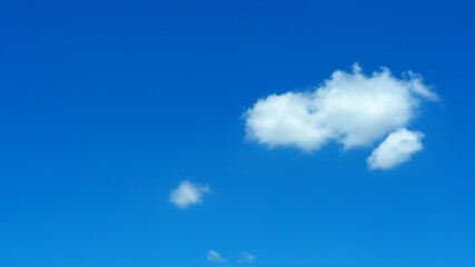 Fototapeta na wymiar Blue sky background with tiny clouds. Concept relax, freedom, wonderful nature, nice day, Heaven God.