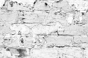 Texture of a brick wall with cracks and scratches which can be used as a background