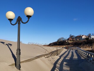 street lamp on the sand beach