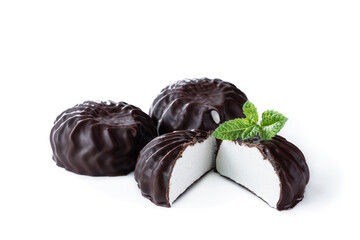 halved chocolate-coated marshmallow treat isolated on white background