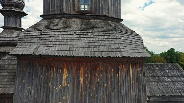 Rural landscape flying around the old wooden church.