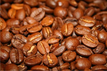Cereal coffee in bulk on a black background.