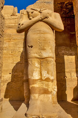 The pillars of Osiris in the courtyard of the Temple of Ramses III, Karnak, Egypt