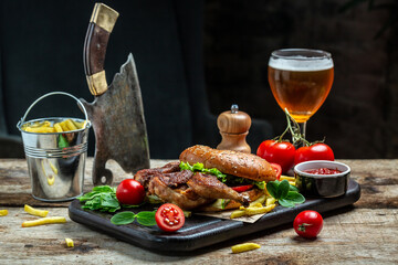 Big burger with chicken, Beer and Fries, patty burger with fries and dips meal. banner, menu, recipe place for text