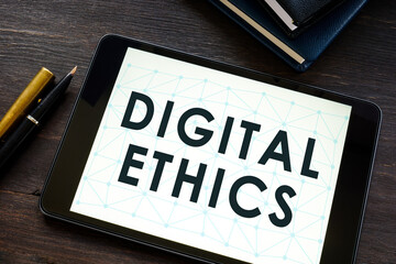Tablet with words digital ethics on the screen.