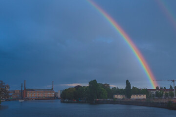 Rainbow over a river, rainbow over the Spree River in Berlin, Germany, rainbow over Berlin Schöneweie