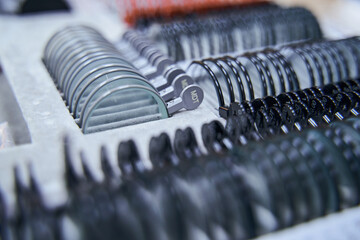 Trial lens set for ophthalmic testing device in clinic