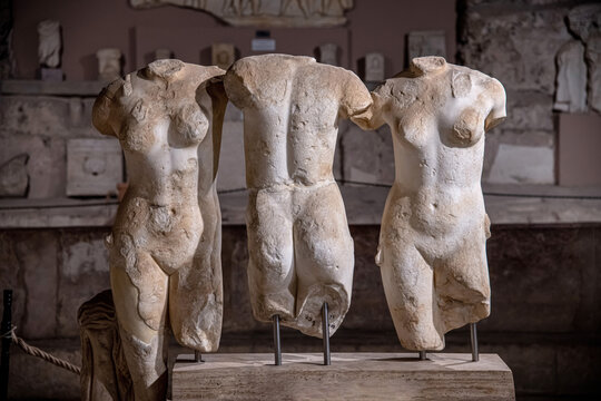 Antalya, Turkey - July 18, 2021: Three Graces Statue. Sculptures and Ancient ruins in the Side Archeology Museum, Antalya, Turkey.