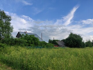 village country russian house in the summer field
