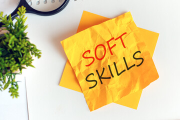 text soft skills on crumpled yellow paper, concept