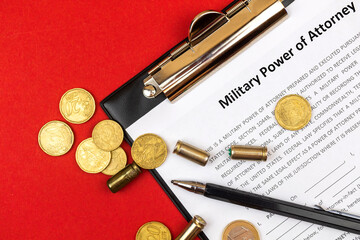 Military power of attorney form. Office business desktop with money and pistol shells. Top view...