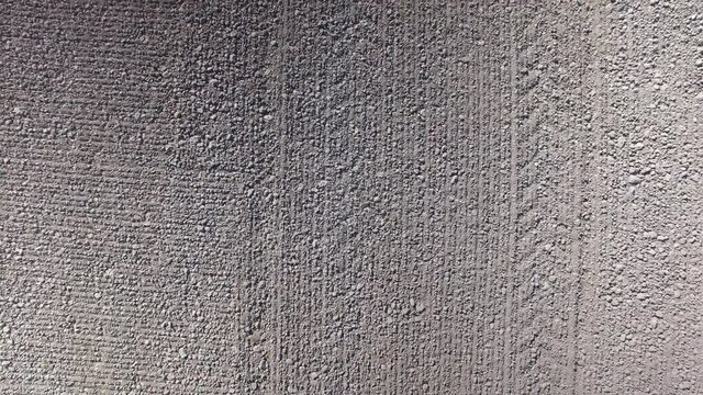 Aerial view of zooming out of a plowed acre