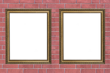 Fototapeta premium two wooden frames with a carved pattern for paintings on a brick wall background
