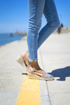 Girl legs and colored shoes women's espadrilles a summer style
